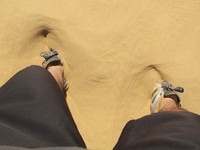 Hiding ugly toenails in sand